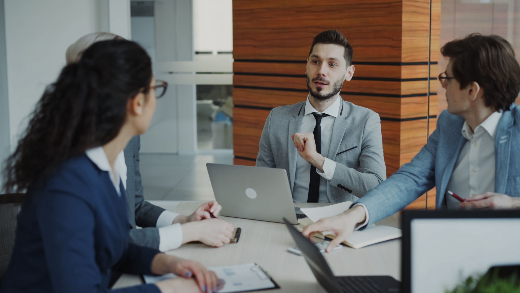 Diverse corporate team collaborating during a business meeting