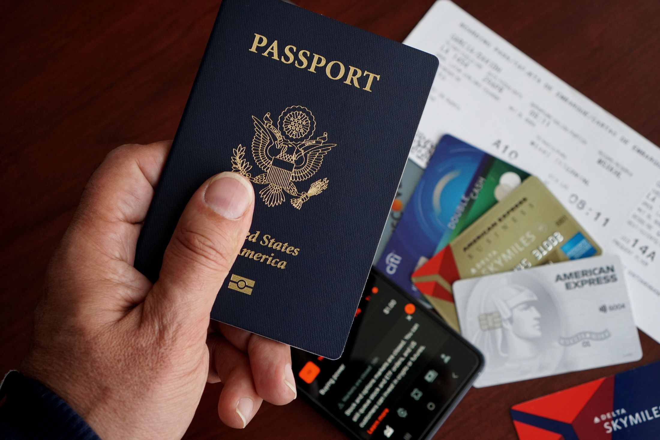 Passport, tickets and travel essentials prepared for a custom itinerary