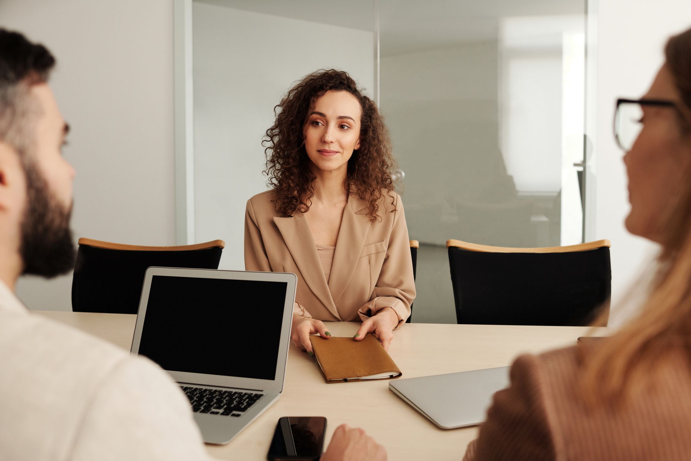Professional candidate attending a job interview in a modern office