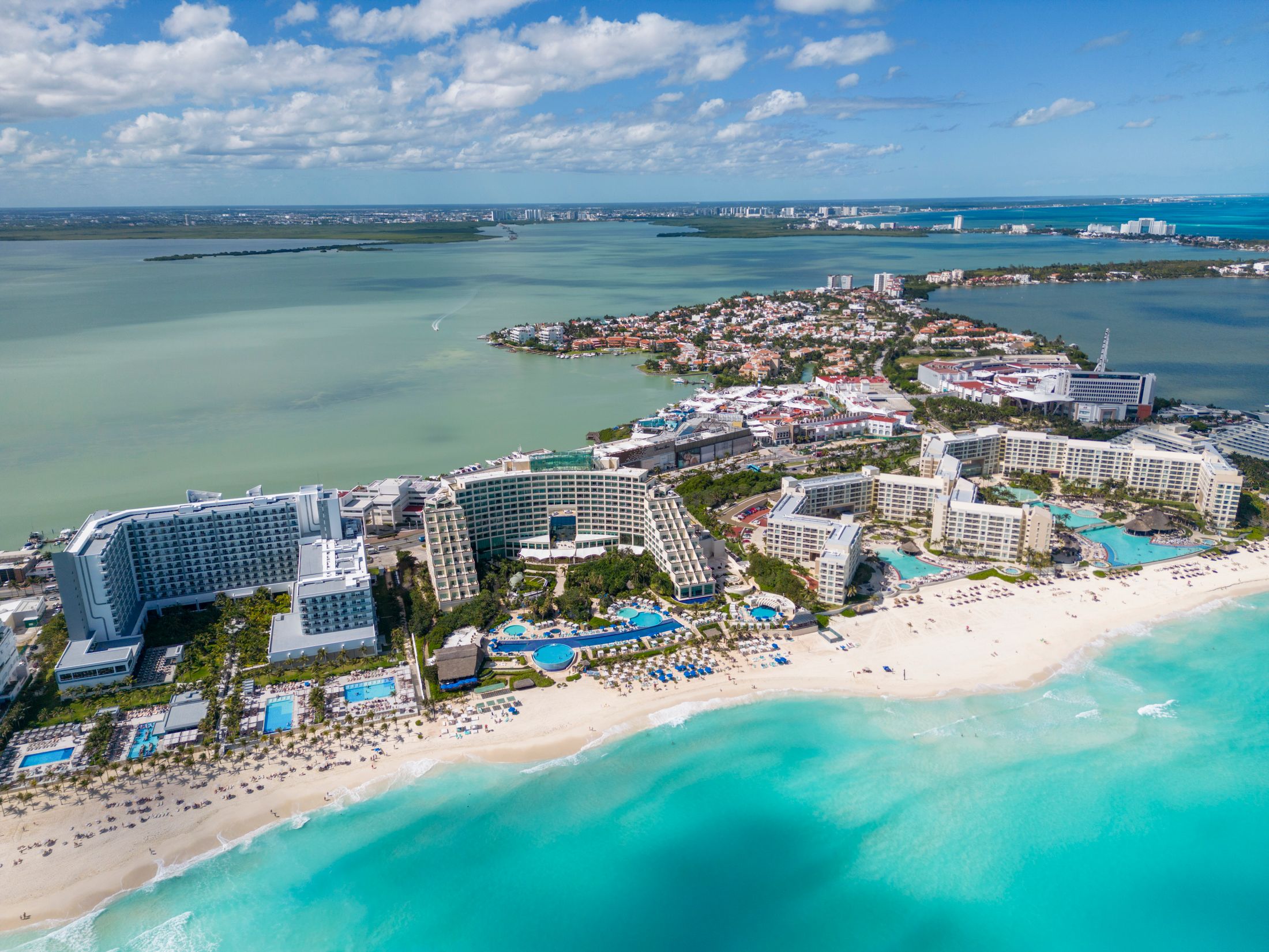Aerial view of a vibrant coastal holiday destination and turquoise sea