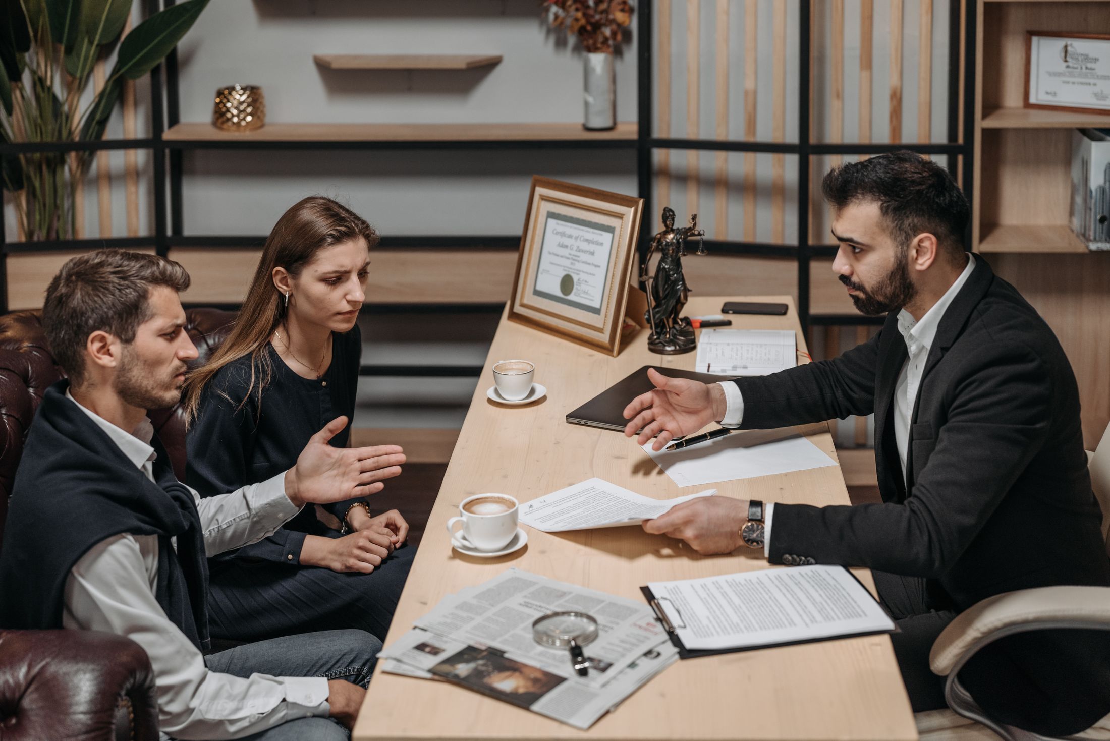 Travel consultants guiding clients through visa documentation